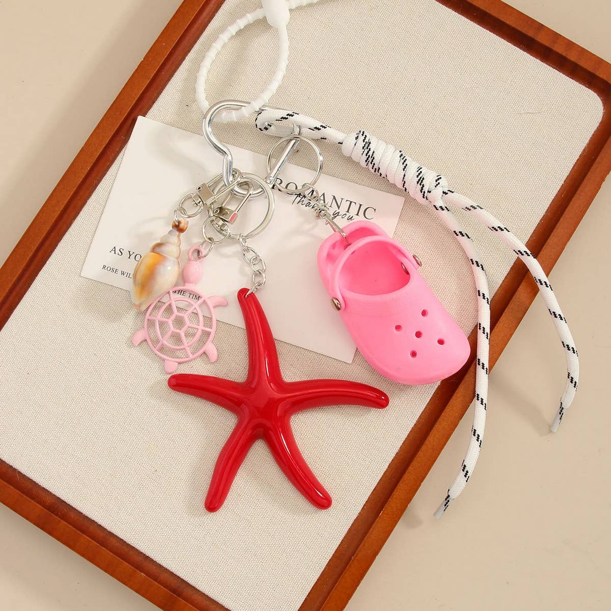 MINI CLOG KEYCHAIN WITH STARFISH BAG CHARM_CWMM7557