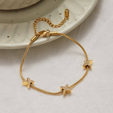 18K GOLD X CHARM BRACELET STAINLESS STEEL DESIGN_CWAJE4731