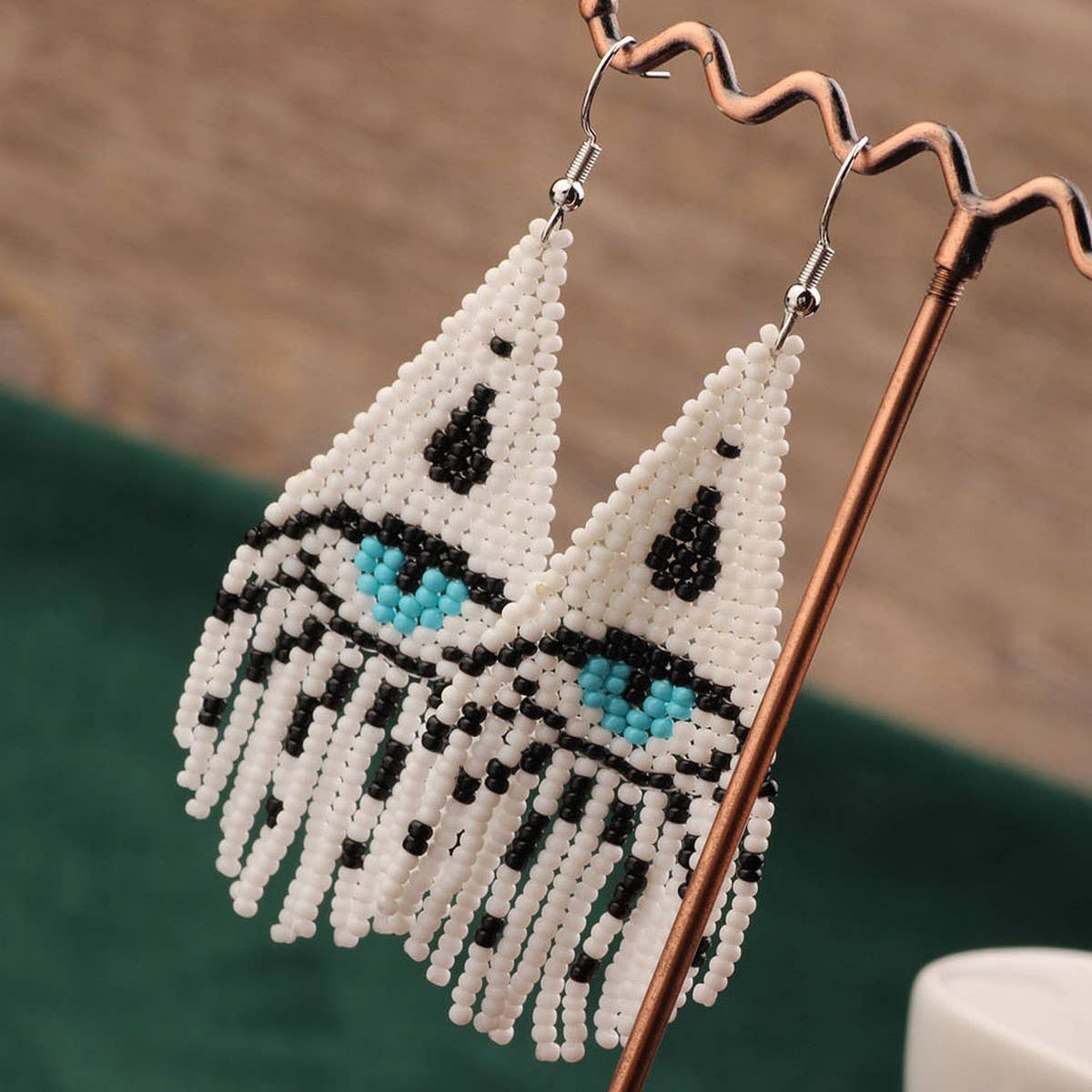 Western Devils Eye Braided Tassel Earrings