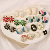 NEW SIMPLE HOLLOW GRID FOUR LEAF EARRINGS_CWAJE3985