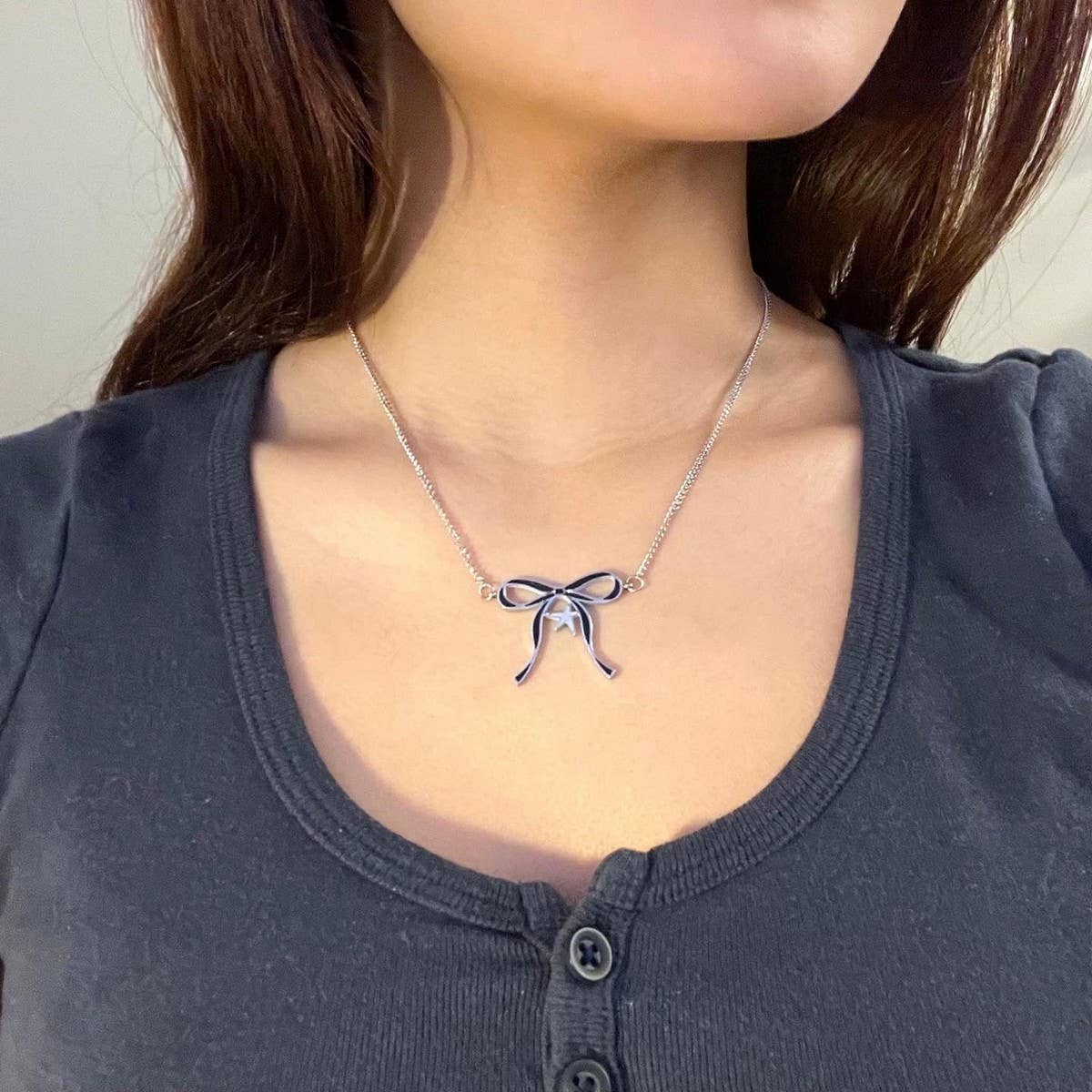 DOUBLE SIDED OIL DRIP STAR BOW EARRINGS_CWAJE5042