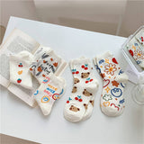MILKY WHITE DOODLE SMILEY PATTERN CREW SOCKS_CWMS0208
