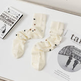 HOLLOW JACQUARD MIDDLE CALF SOCKS_CWMS0650