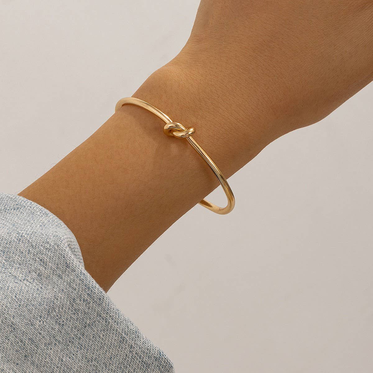 SIMPLE DOUBLE LAYER HOLLOW KNOTTED OPEN BRACELET_CWMM3101