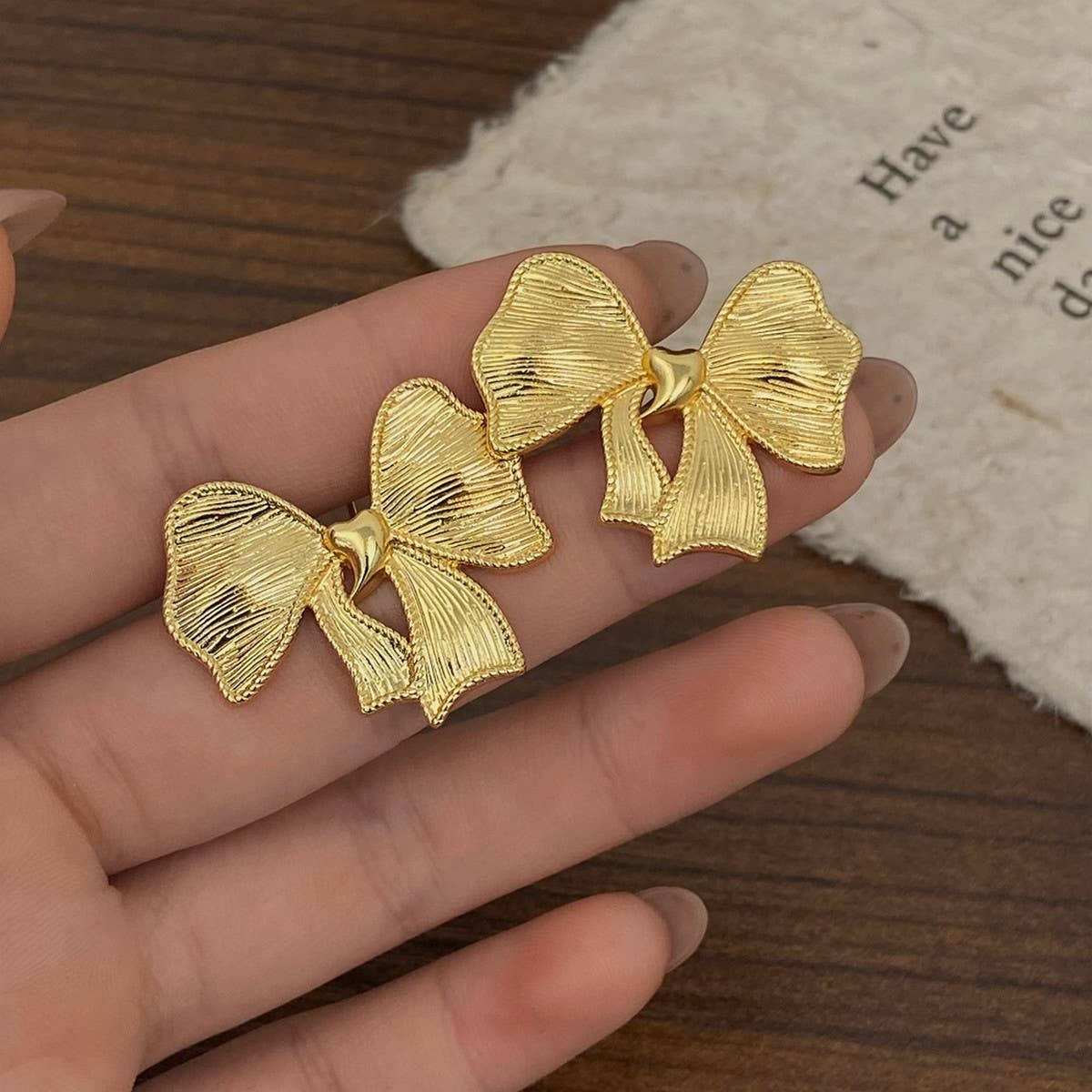 NEW SIMPLE TEMPERAMENT BOW EARRINGS FOR WOMEN_CWAJE3002