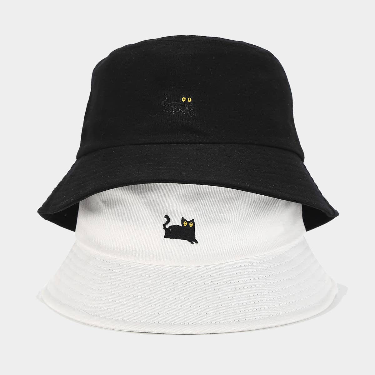 MACAROON COLORED BLACK CAT EMBROIDERED BUCKET HAT_CWAH1631