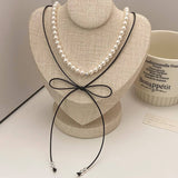 FASHIONABLE PEARL HIGH GRADE BOW PENDANT NECKLACE_CWAJE3081
