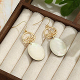 TEARDROP SHAPED WHITE SHELL TASSEL EARRINGS_CWMM4346