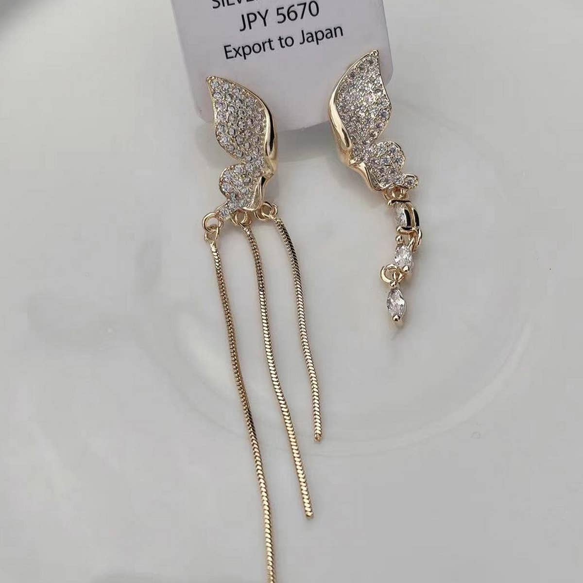 PREMIUM ASYMMETRICAL TASSEL_CWAJE1317