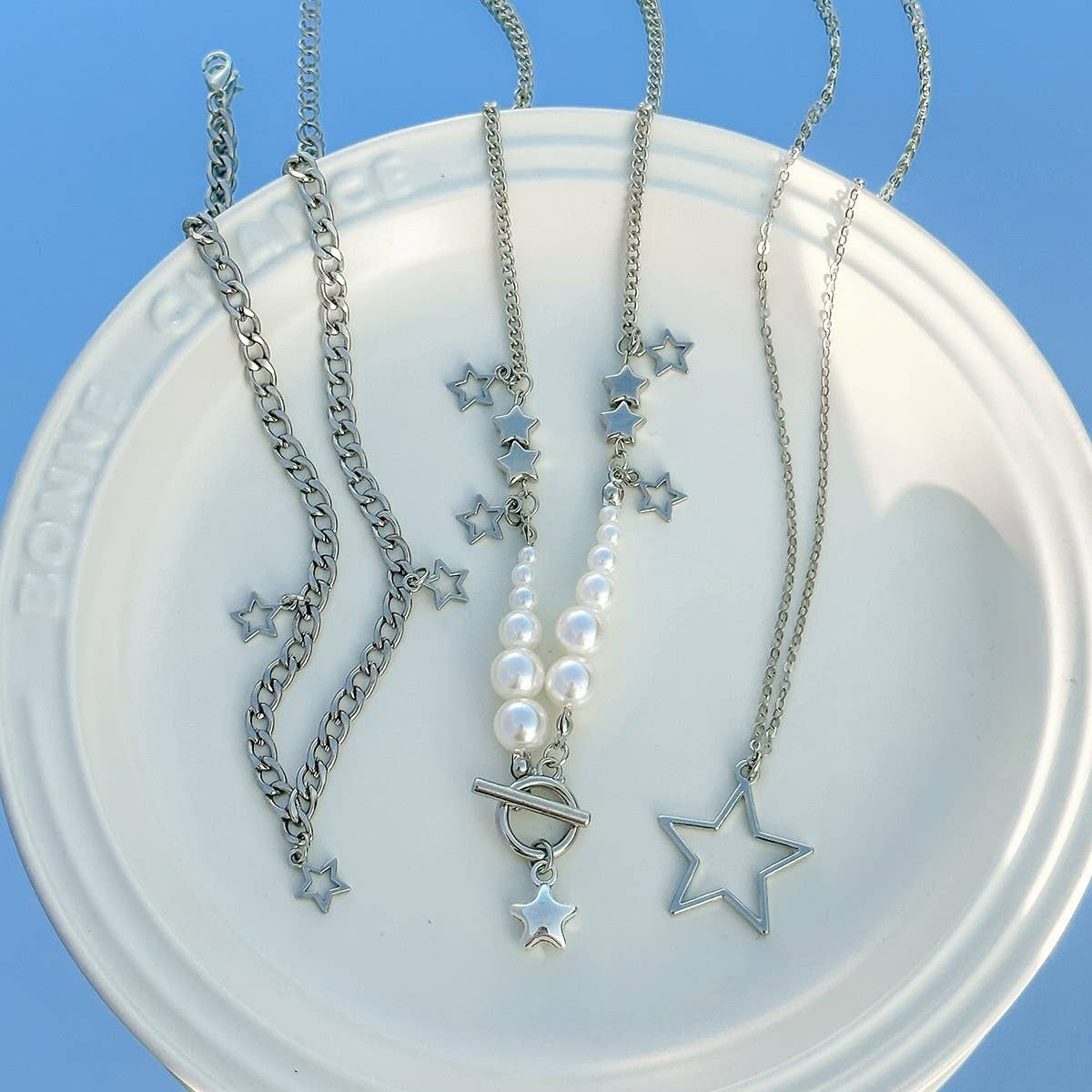 BEADED NECKLACE WITH STAR SHAPED PENDANT TASSELS_CWAJE1158