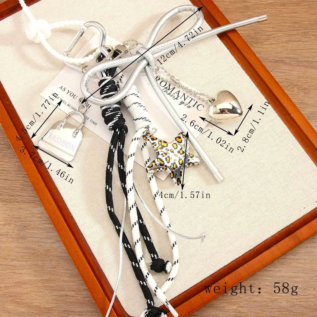 LEOPARD STAR MINI BAG CHARM WITH HEART BOW_CWMM7562