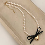 BOWKNOT DOUBLE PEARL HEART PENDANT NECKLACE_CWAJE3080
