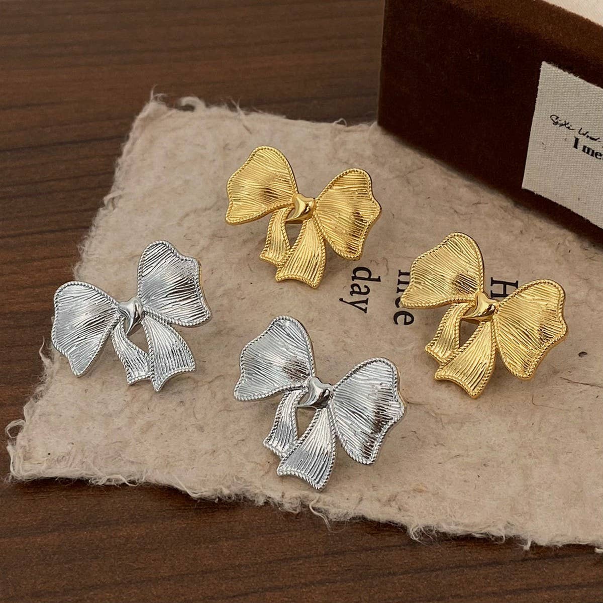 NEW SIMPLE TEMPERAMENT BOW EARRINGS FOR WOMEN_CWAJE3002
