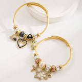 ADJUSTABLE STEEL BRACELET WITH BEAR HEART CROSS_CWMM8583