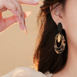 LEOPARD PRINT OVAL LETTER TREND EARRINGS_CWASC1331