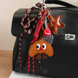 QUIRKY LEATHER MONSTER KEYCHAIN WITH RED NOSE_CWMM7631