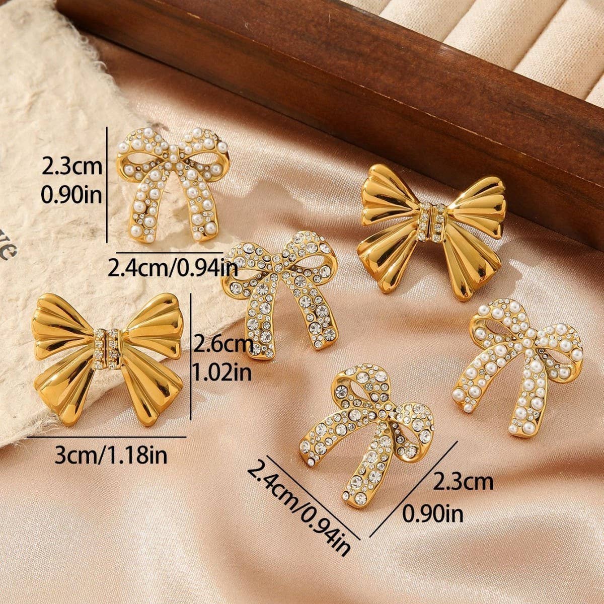 Titanium Steel Bow Earrings Inlaid With Rhinestones_Cwmm3605