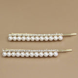 A PAIR OF ELEGANT PEARL AND RHINESTONE HAIR PIN_CWAHA1232