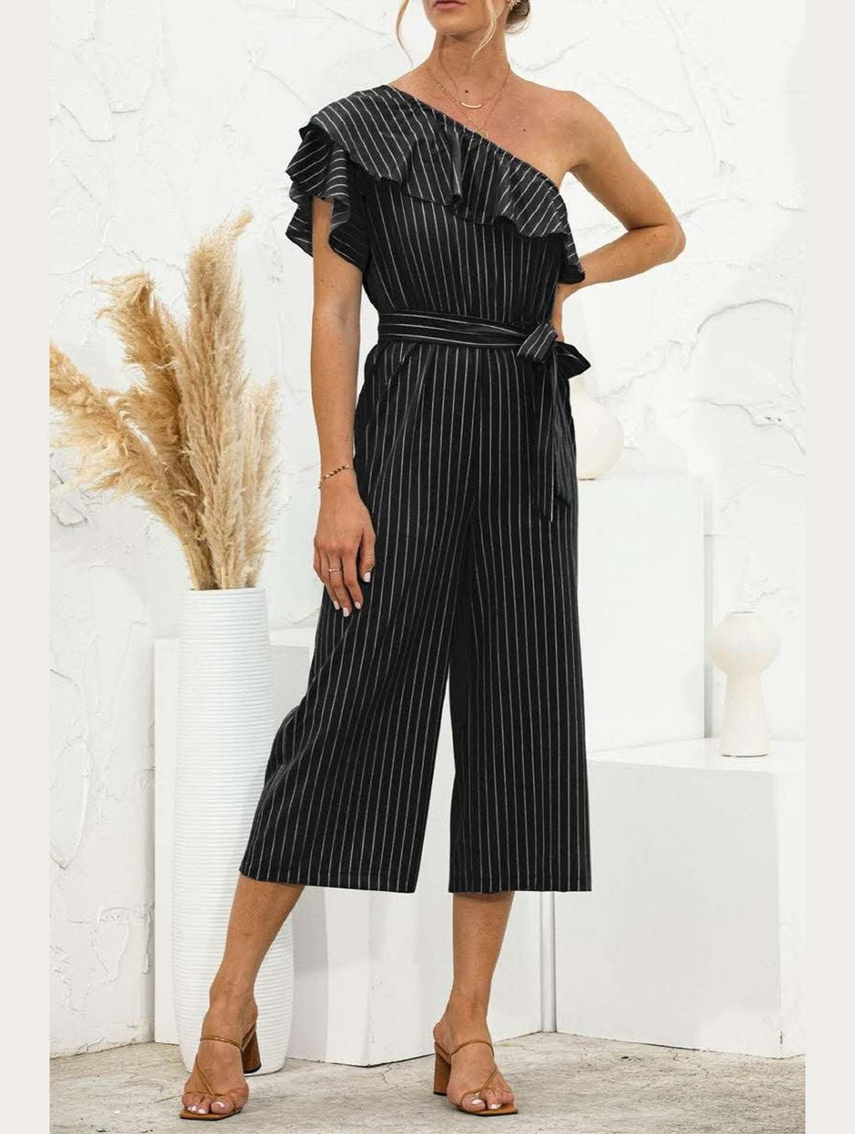 SLANTED SHOULDER RUFFLED STRIPED JUMPSUIT - Doublju